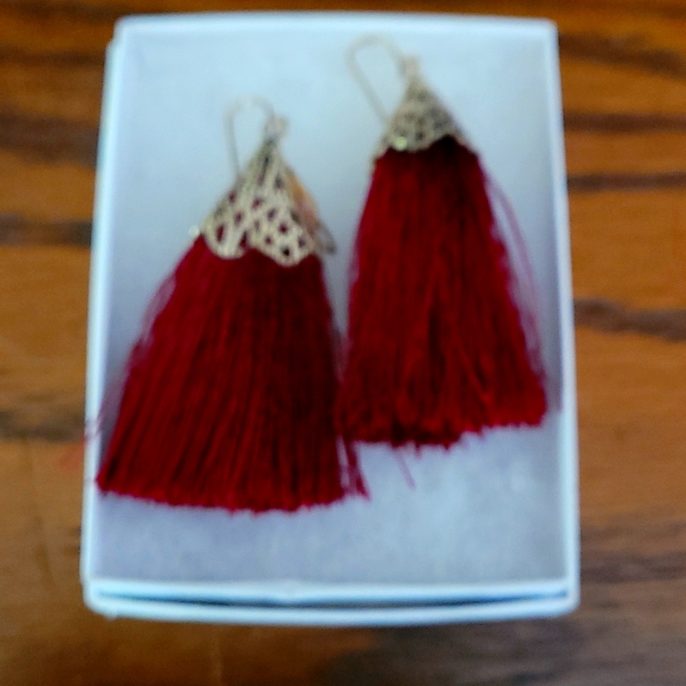 Red tussle earrings